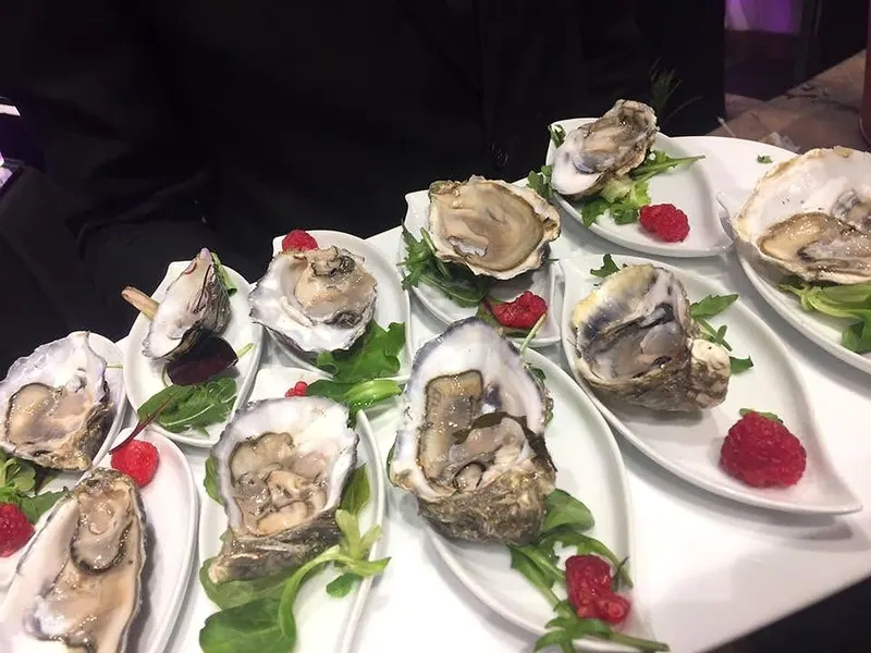 Oysters, raspberry and herbs
